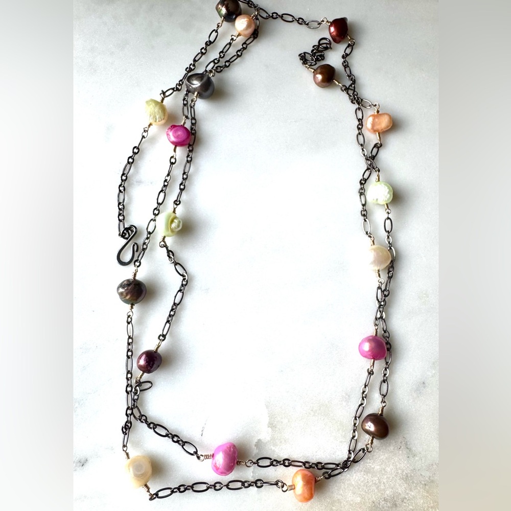 Multi colour fresh water pearls necklace. Gun metal and 14k gold filled. 44”